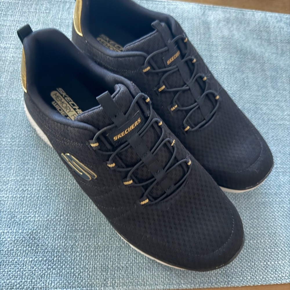 Skechers Women's Black Sneakers with Gold Highlights